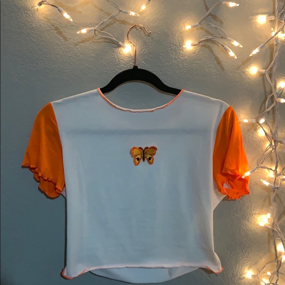 White crop top, Lettuce sleeves.